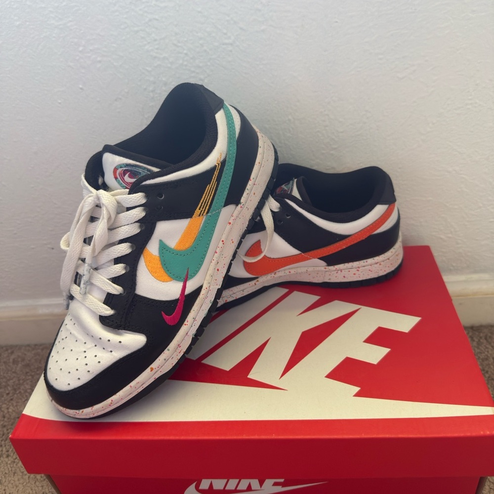 Nike dunks Black and White Sneakers with Teal and Orange Accents